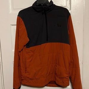 The north face size medium quarter zip pull over. Gray and orange.